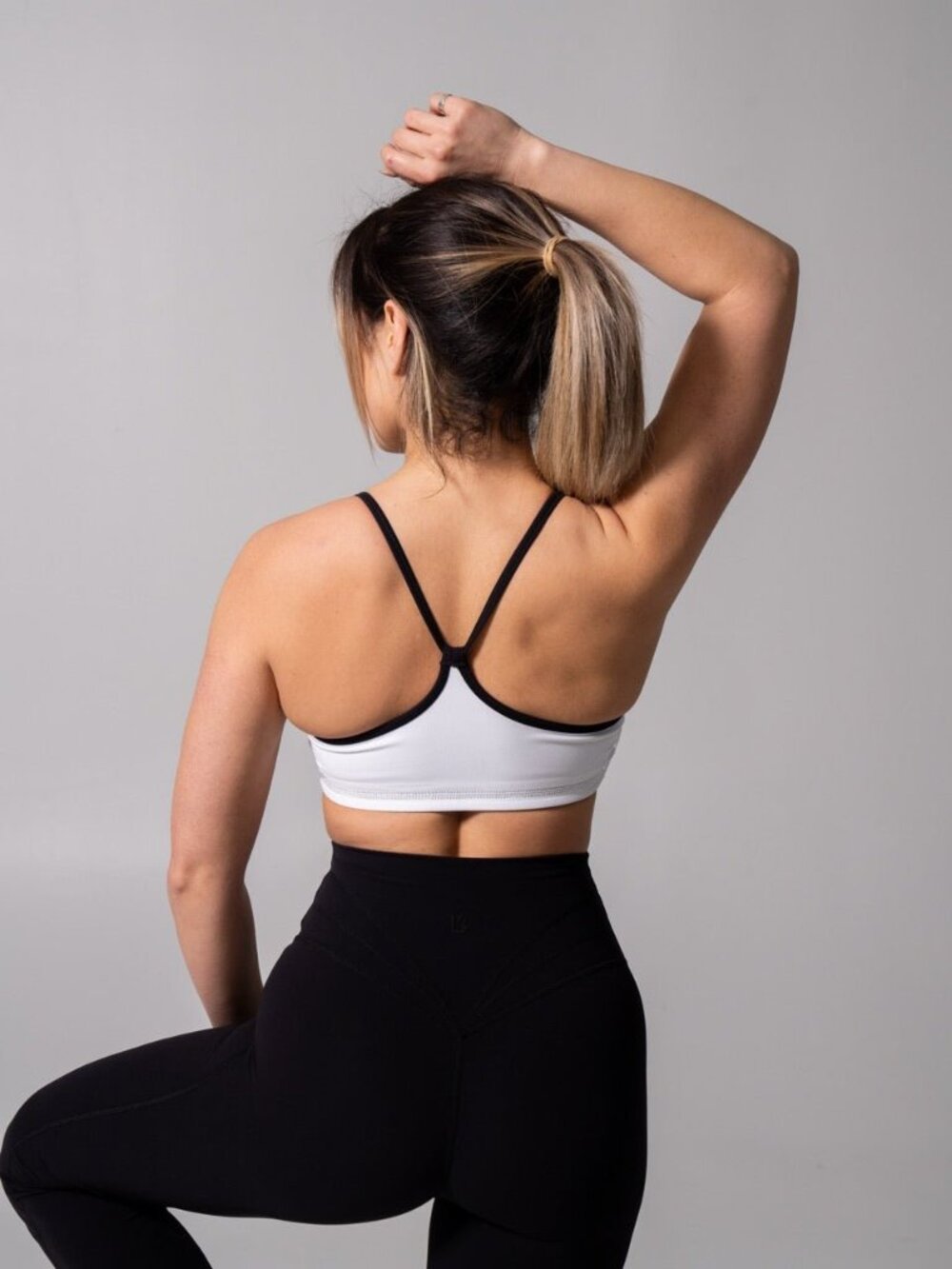 BuffBunny Reversible White and Black Racerback Sports Bra